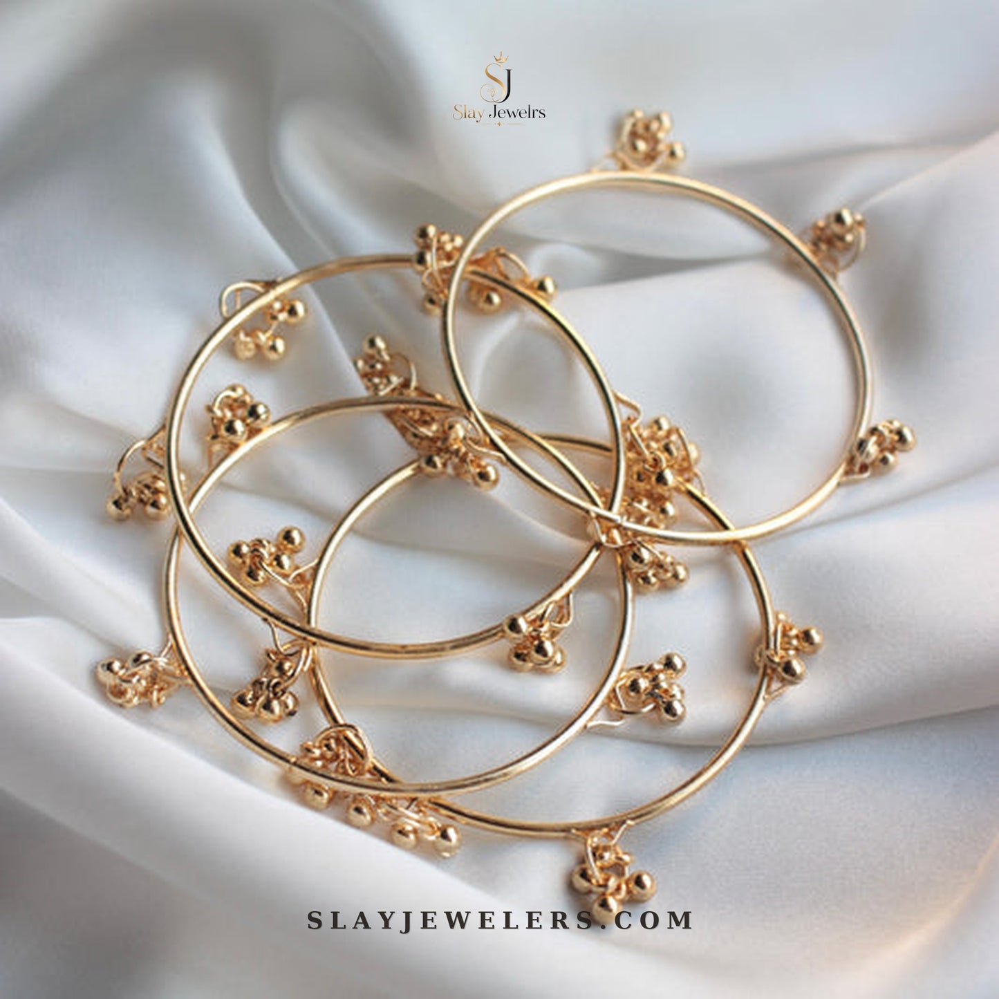 Gold Kashmiri bangles 4-piece set with delicate floral charm clusters — Slay Jewelers
