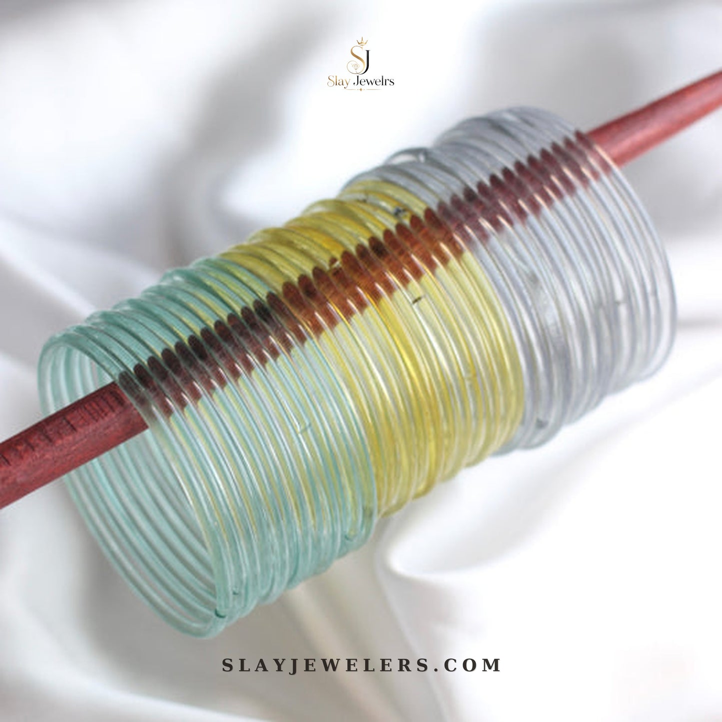 Mint, lemon yellow, and crystal clear jelly bangle trio — Slay Jewelers