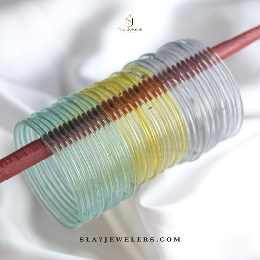 Mint, lemon yellow, and crystal clear jelly bangle trio — Slay Jewelers