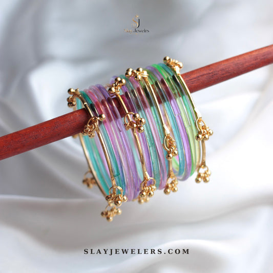 Pastel purple, mint, and pink jelly bangles with gold Kashmiri charms — Slay Jewelers