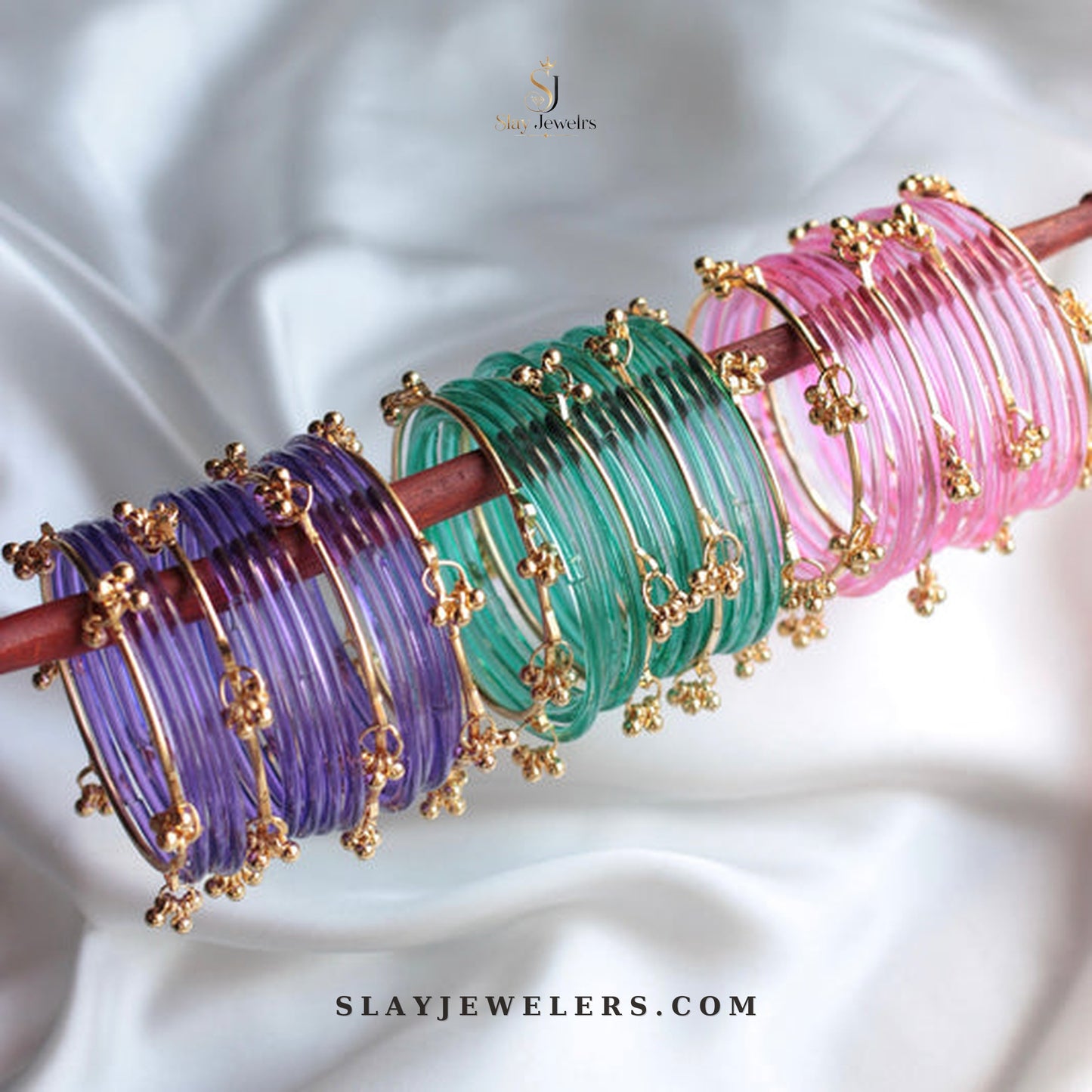 Purple, emerald green, and pink jelly bangle trio with gold Kashmiri charms — Slay Jewelers